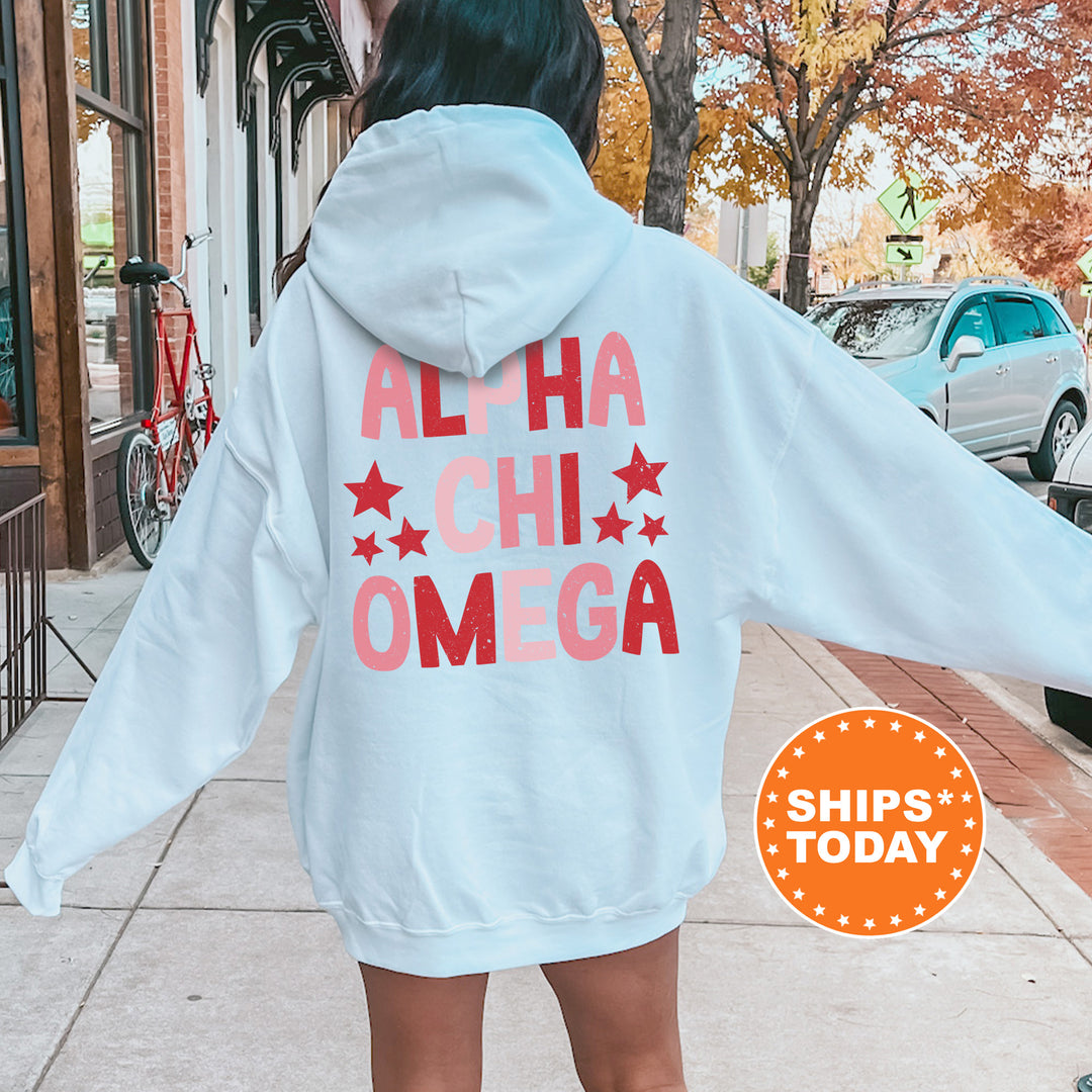 a woman in a white hoodie is walking down the street