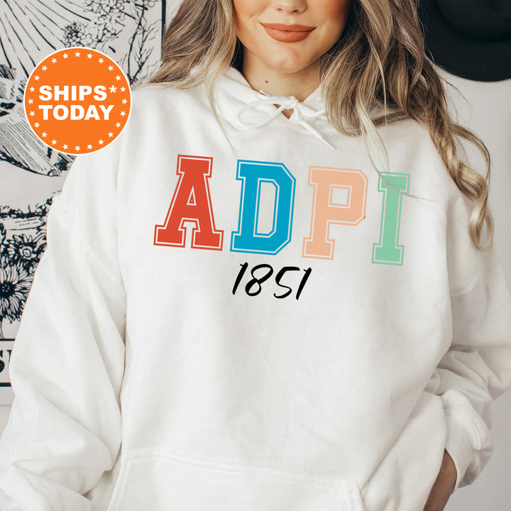 a woman wearing a white hoodie with the words adpi printed on it
