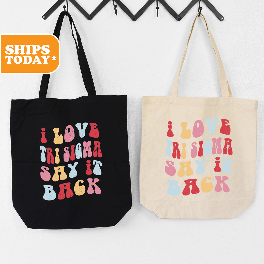 two totes hanging on a wall next to each other