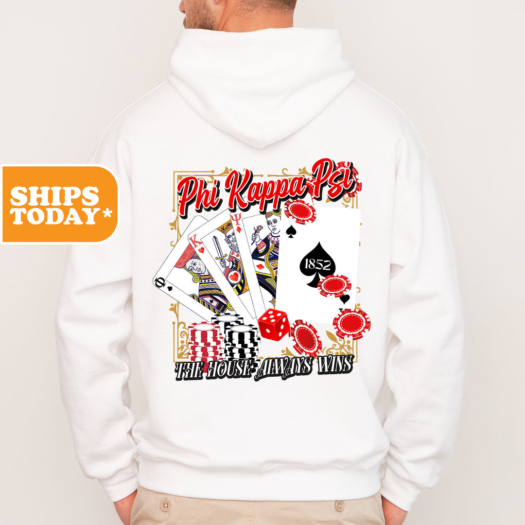 a man wearing a white hoodie with a picture of playing cards on it
