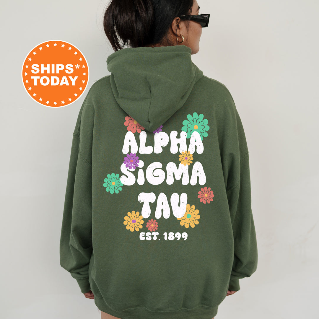 a woman wearing a green hoodie with the words, aloha stigmata