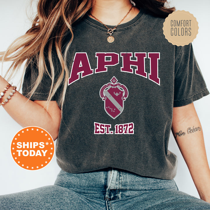 a woman wearing a shirt that says aphi
