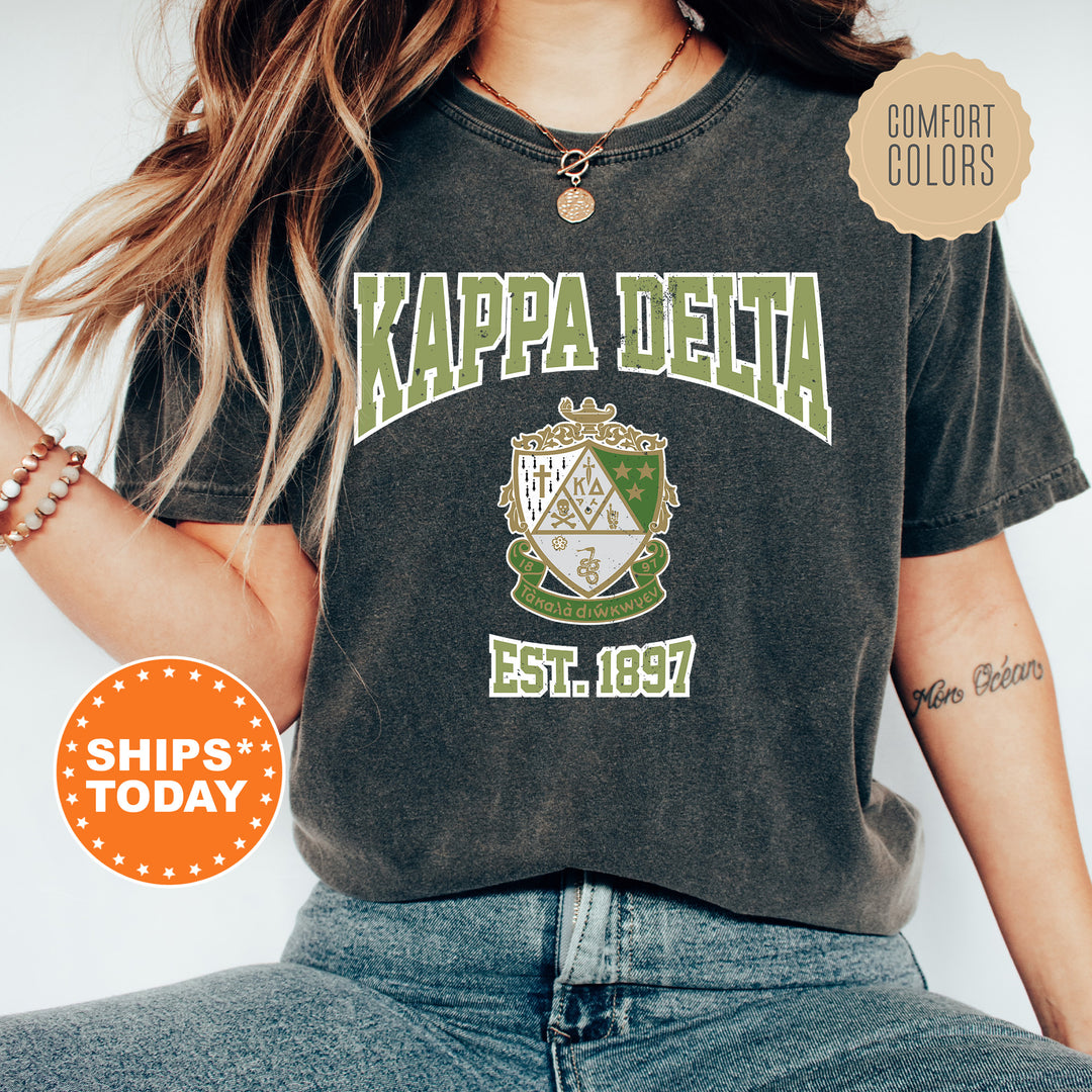 a woman wearing a shirt that says kapa delta