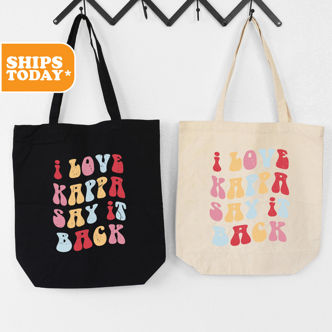 two shopping bags hanging on a wall