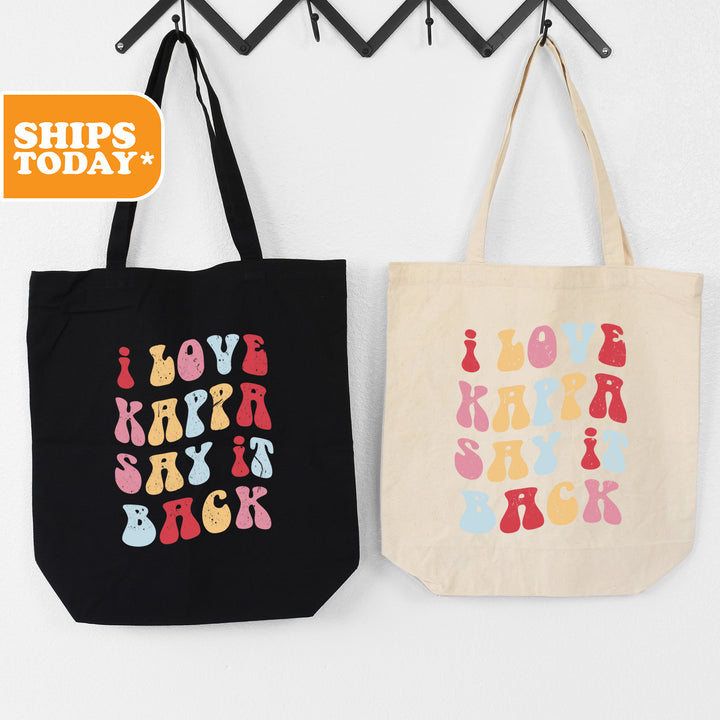 two shopping bags hanging on a wall