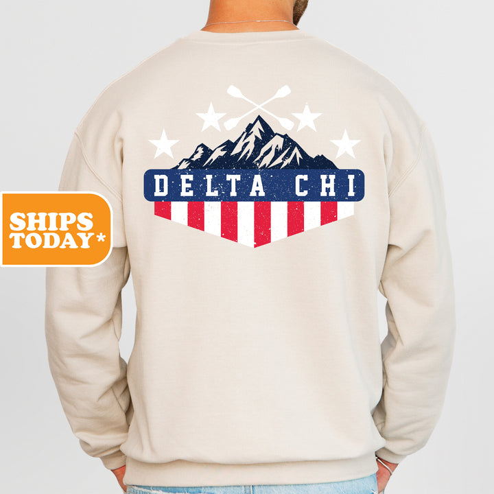 a man wearing a sweatshirt with the words delta chi on it