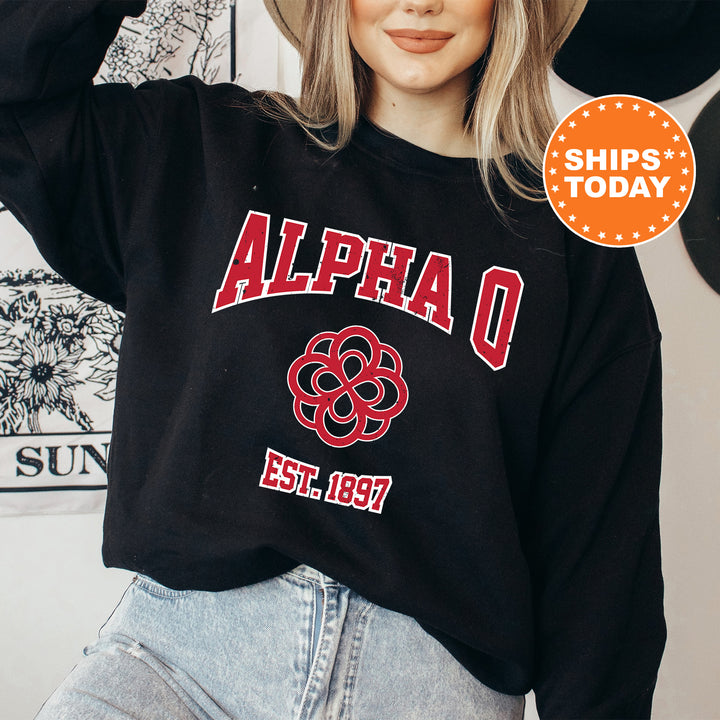 a woman with blonde hair wearing a black sweatshirt