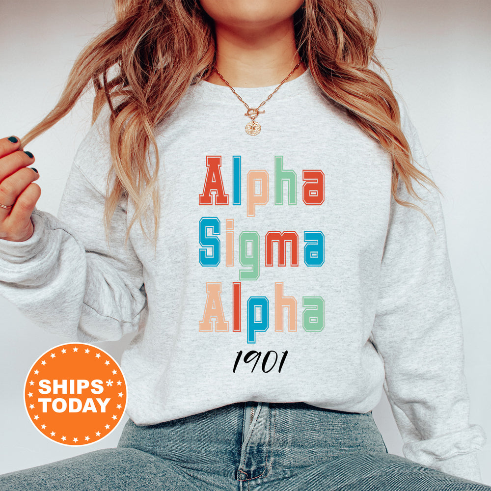 a woman wearing a sweatshirt that says aloha sigmma aloha
