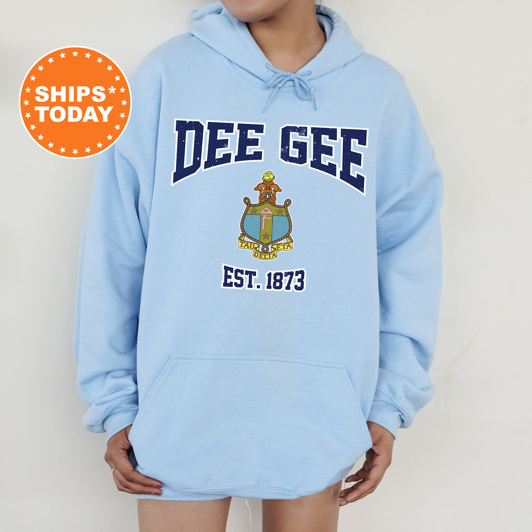 a person wearing a blue hoodie that says dee gee