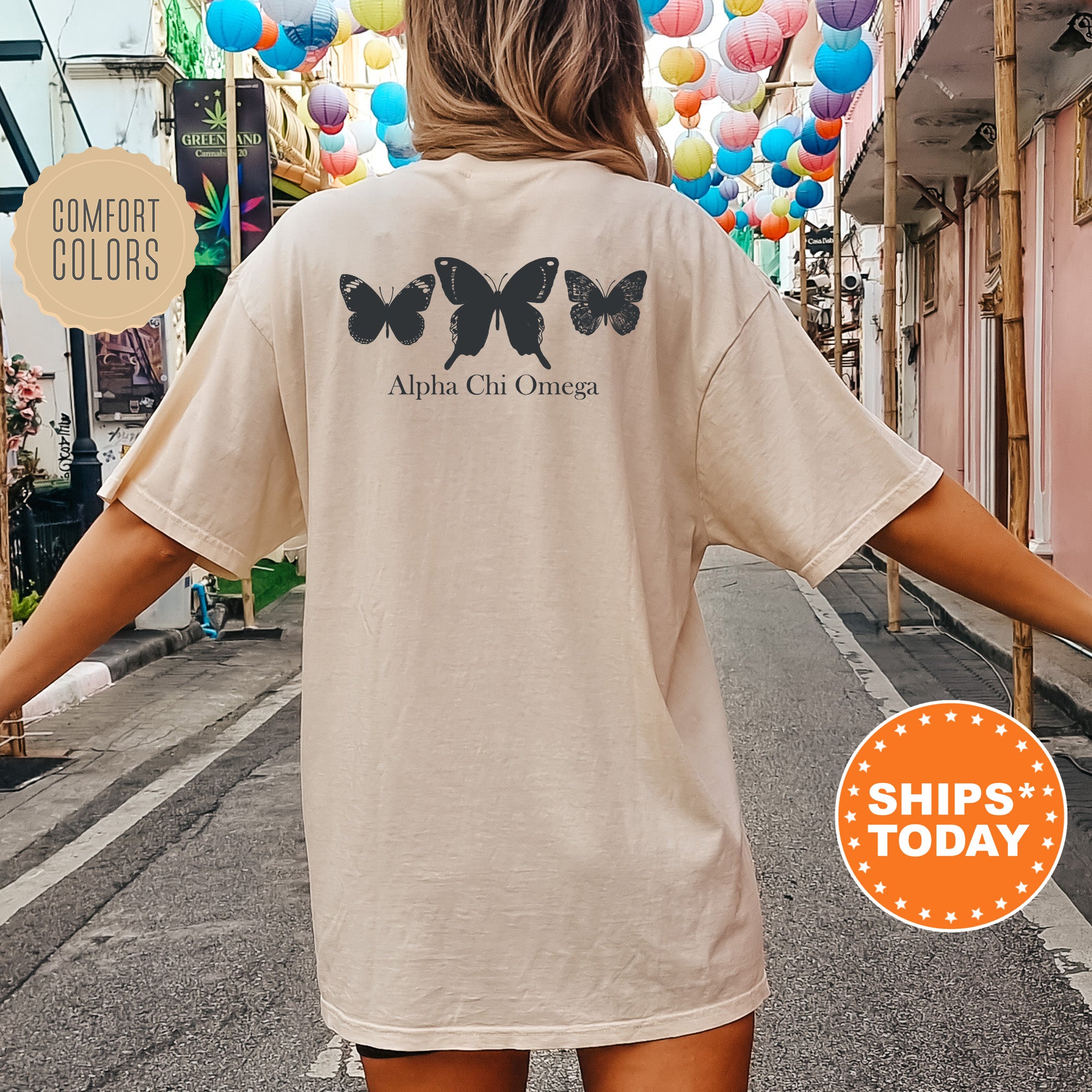 a woman walking down a street with balloons in the background