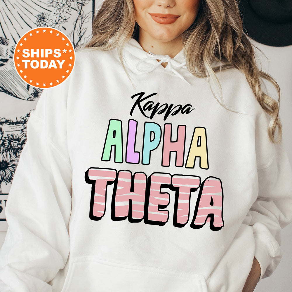 a woman wearing a white hoodie with the words kapaa, alpha