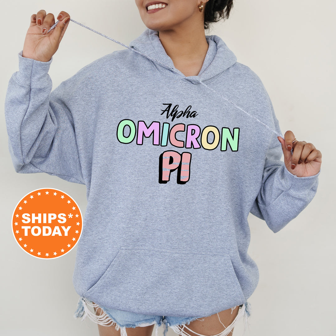 a woman wearing a blue sweatshirt with the word omgron pi on it