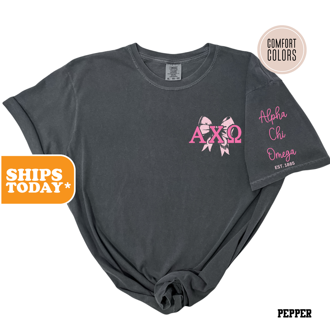 a t - shirt with a pink ribbon on it