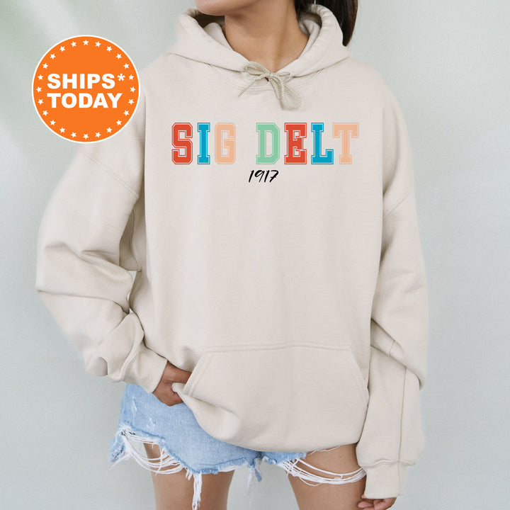 a woman wearing a sweatshirt with the word sigdelt printed on it