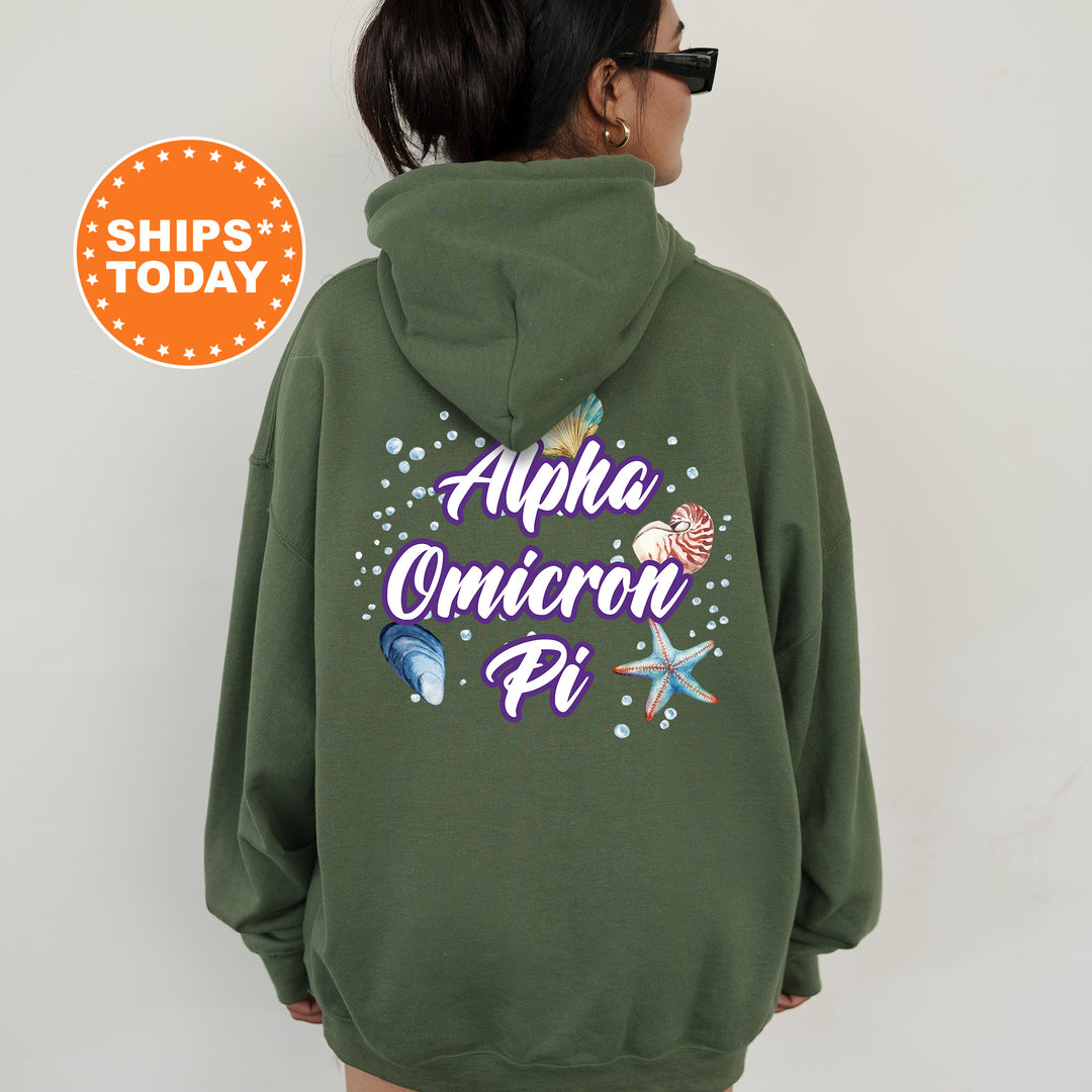 a woman wearing a green hoodie that says aloha unicorn pi