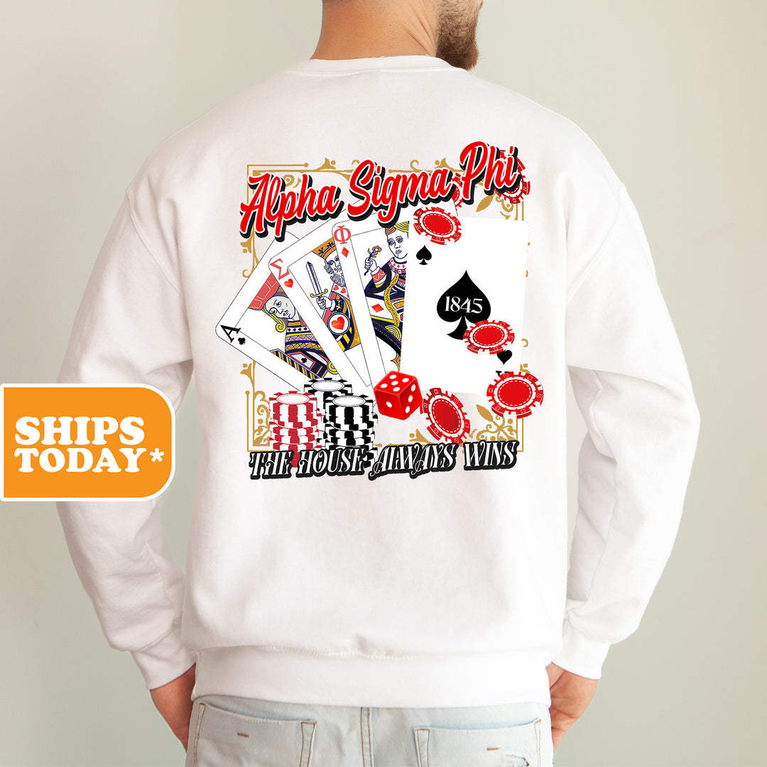 a man wearing a white sweatshirt with a back print of playing cards
