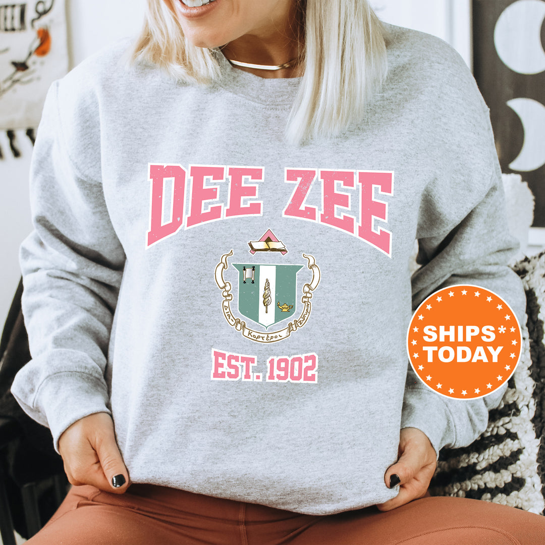 a woman sitting on a chair wearing a sweatshirt