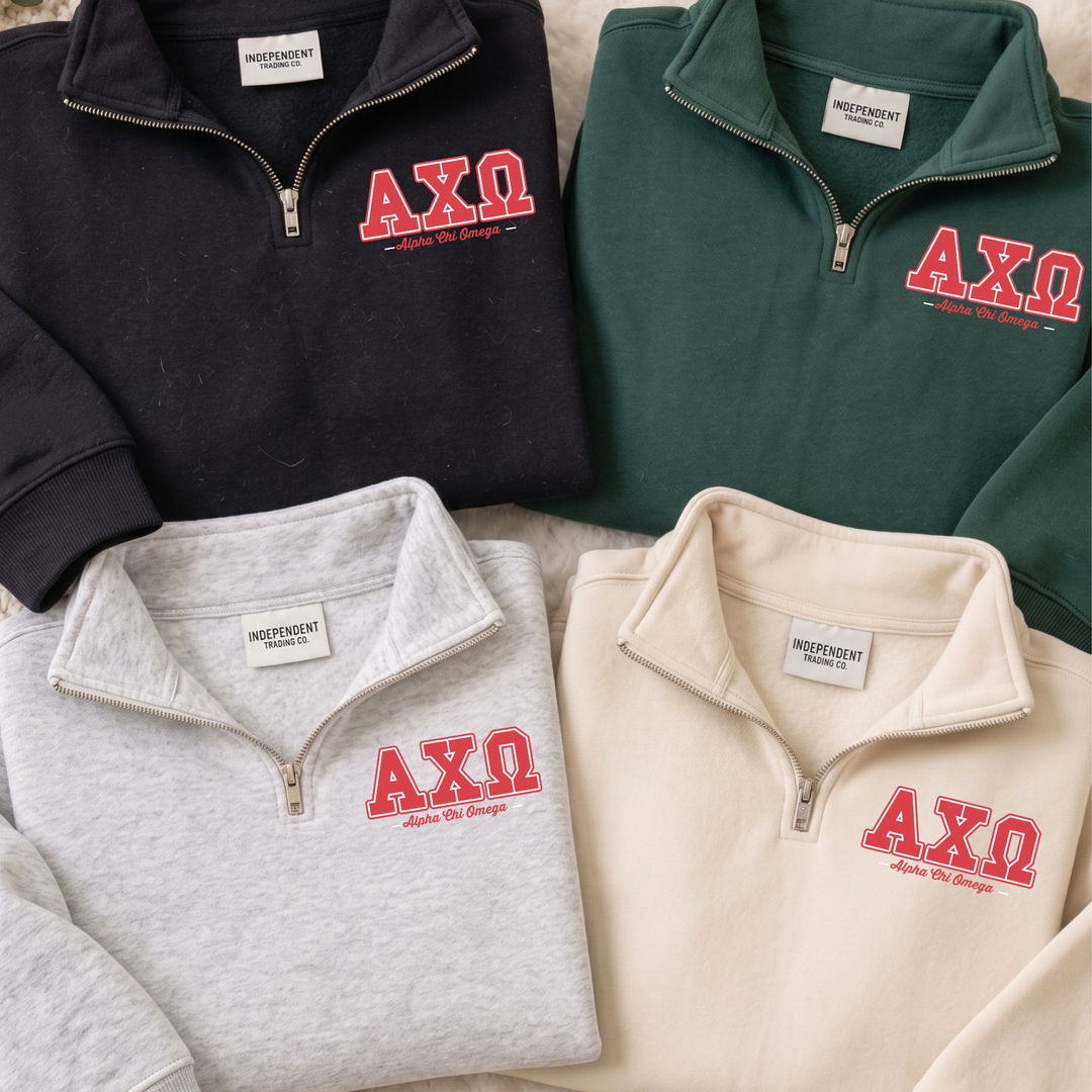Four zip-up sweatshirts with the letters 'AXQ' printed on them.