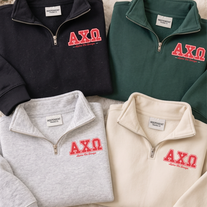 Four zip-up sweatshirts with the letters 'AXQ' printed on them.