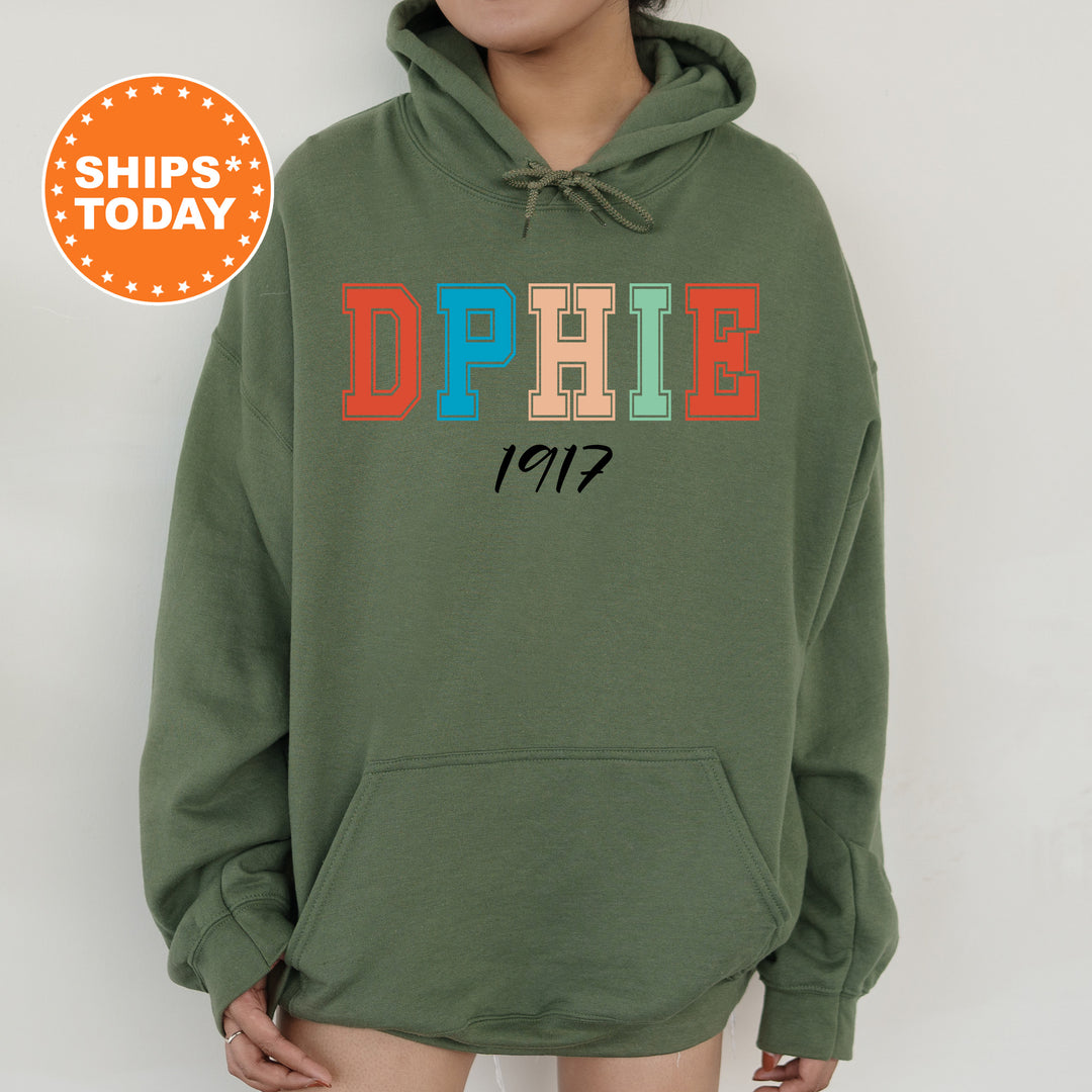 a woman wearing a green hoodie with the word phie printed on it