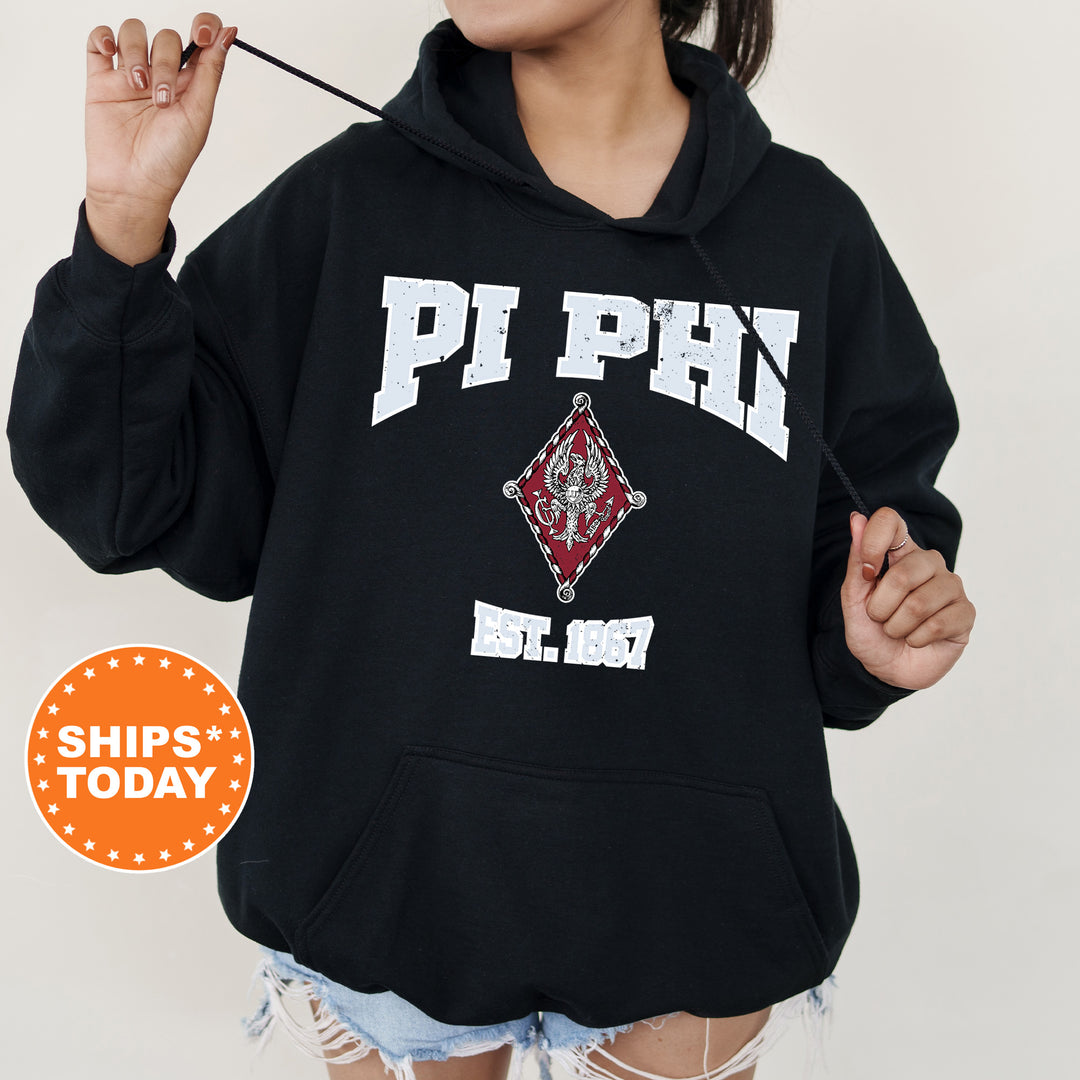 a girl in a black hoodie holding a stick