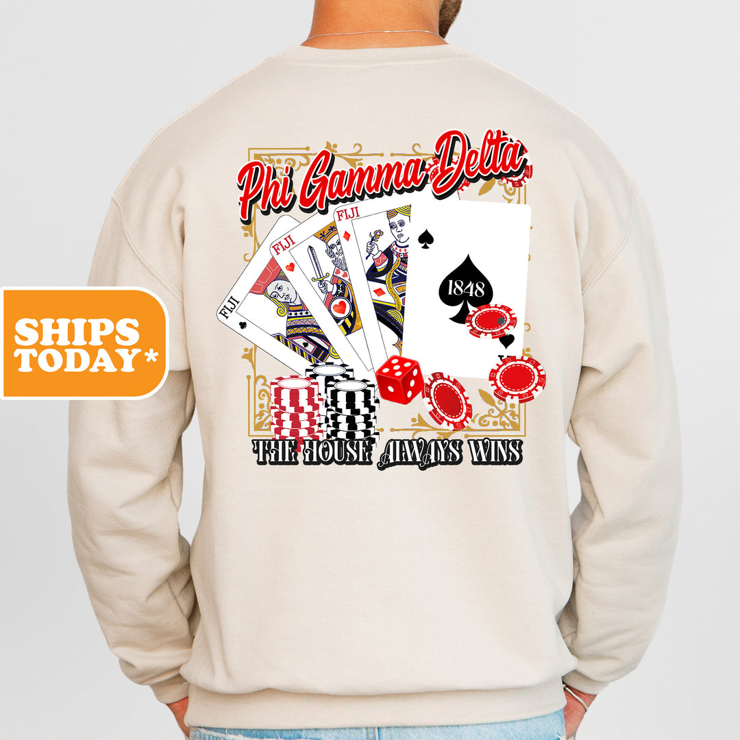a man wearing a sweatshirt that has a picture of a playing card on it