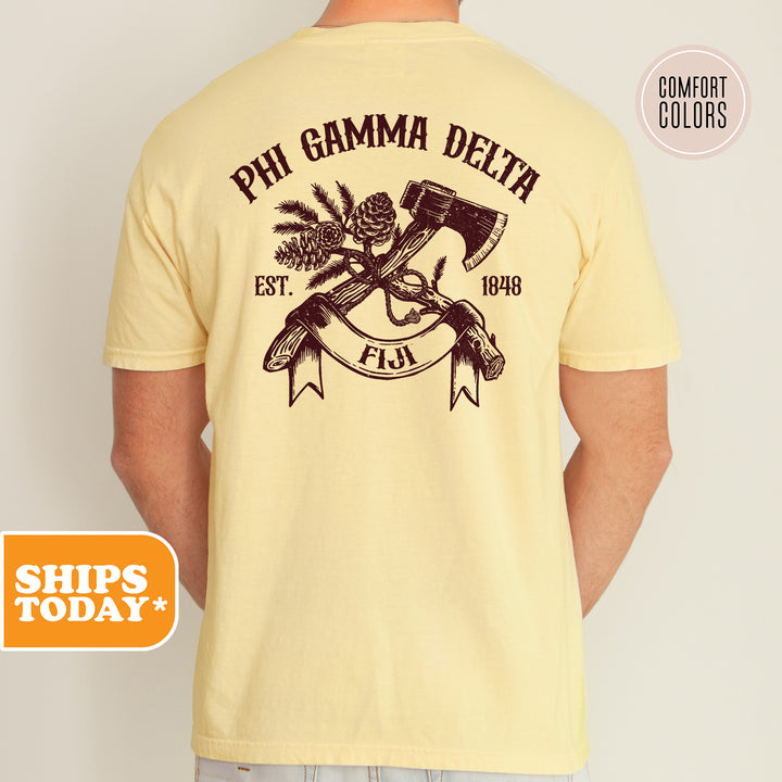 a man wearing a phi gama delta t - shirt