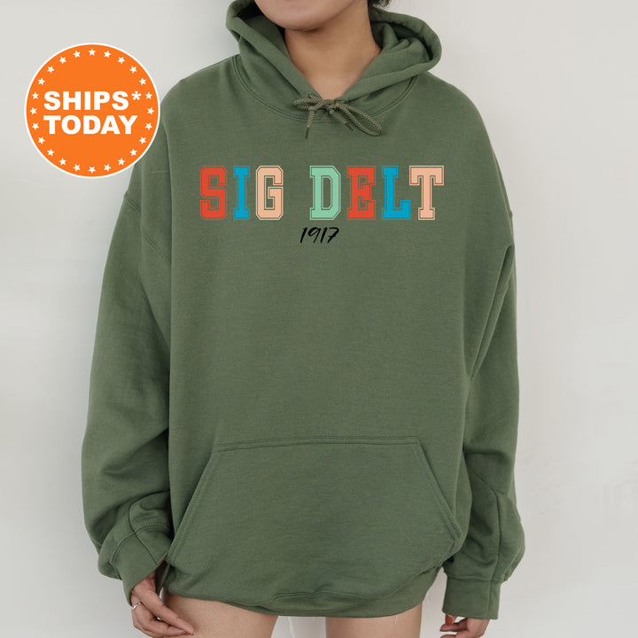 a woman wearing a green sweatshirt with the word seg debt on it