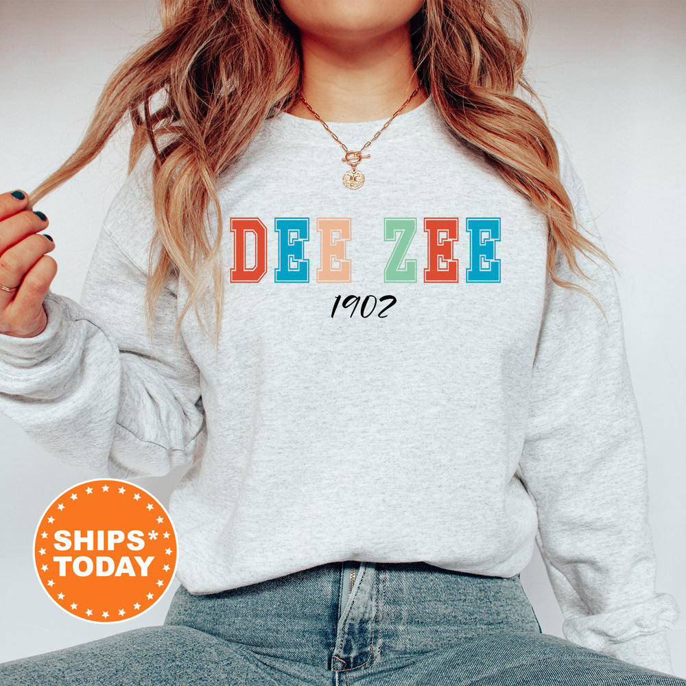 a woman wearing a sweatshirt with the word deze on it