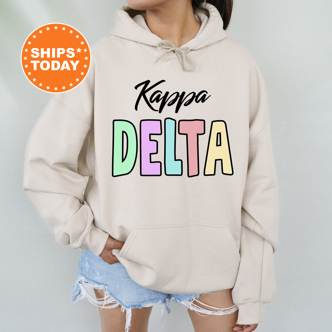 a woman wearing a sweatshirt that says kapaa delta