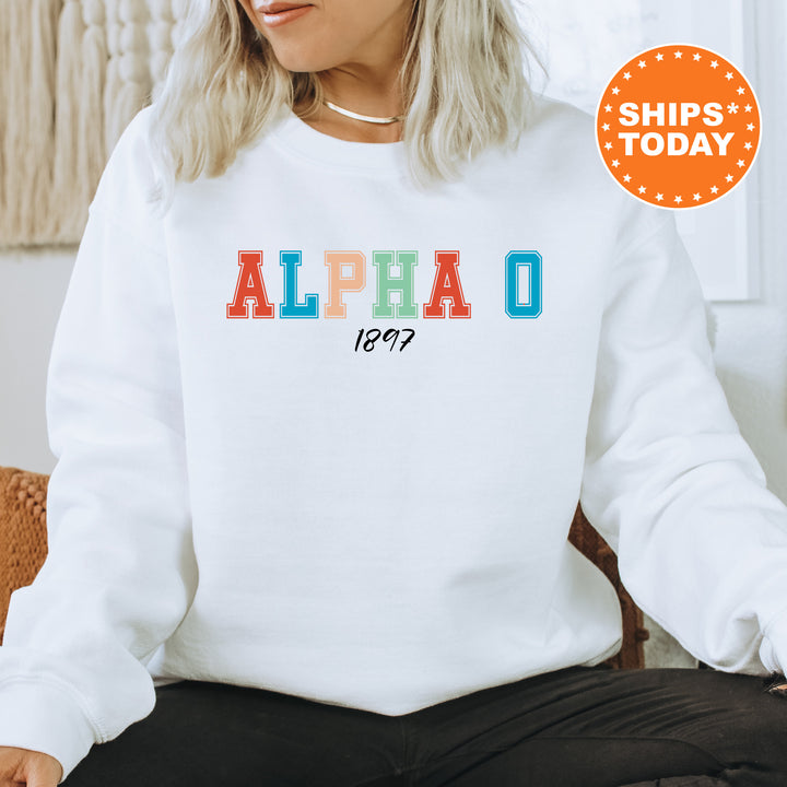 a woman sitting on a chair wearing a white sweatshirt