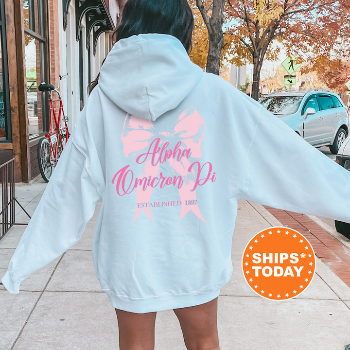 a woman in a white hoodie is walking down the street