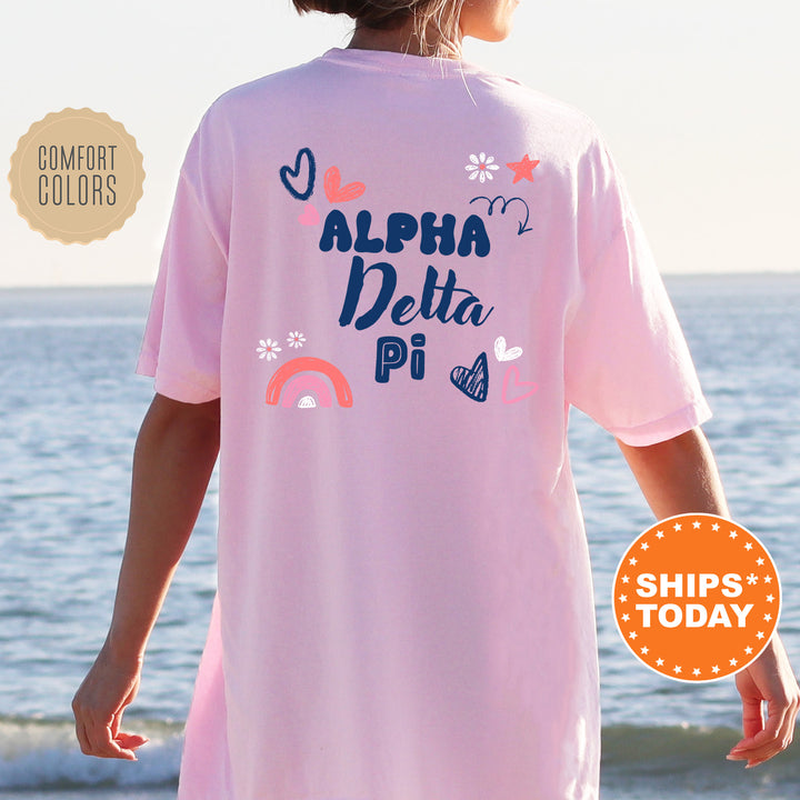a woman wearing a pink shirt that says, aloh delta pi