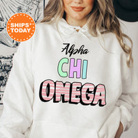 a woman wearing a white hoodie with the words aloha chi onega