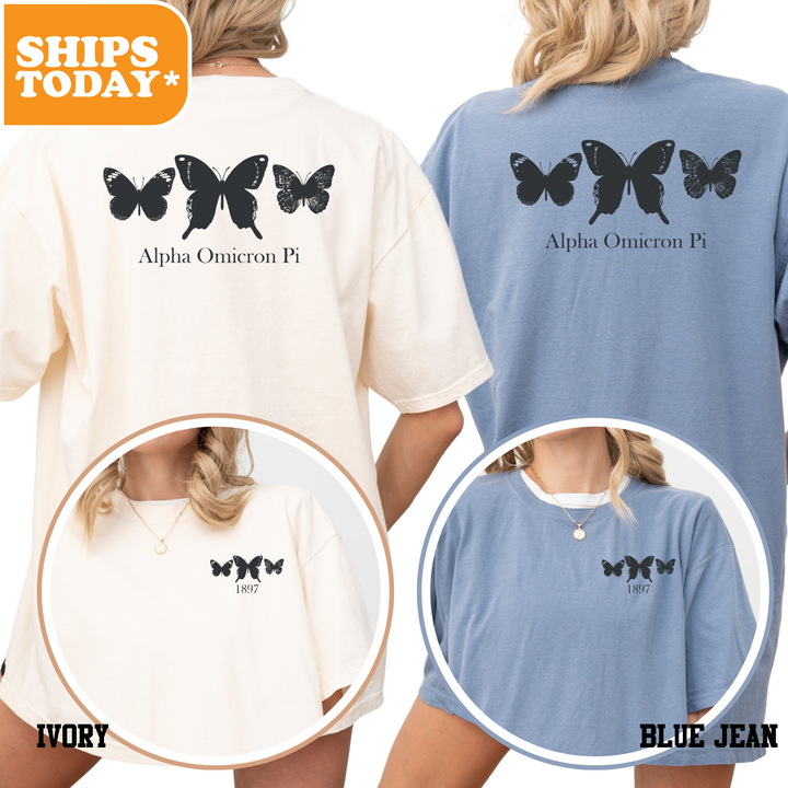 a woman wearing a blue and white shirt with butterflies on it