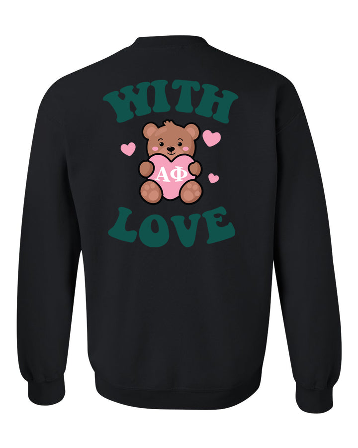 a black sweatshirt with a teddy bear holding a heart