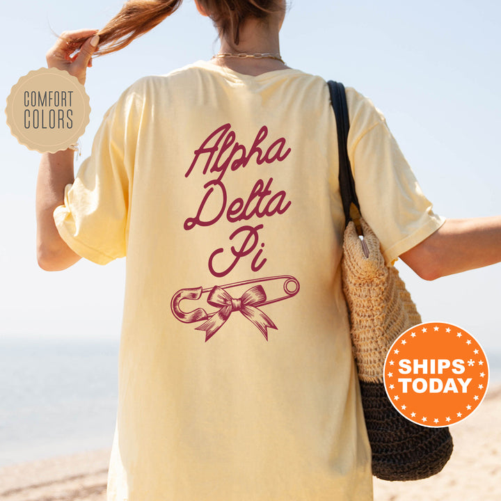 a woman walking on a beach holding a purse