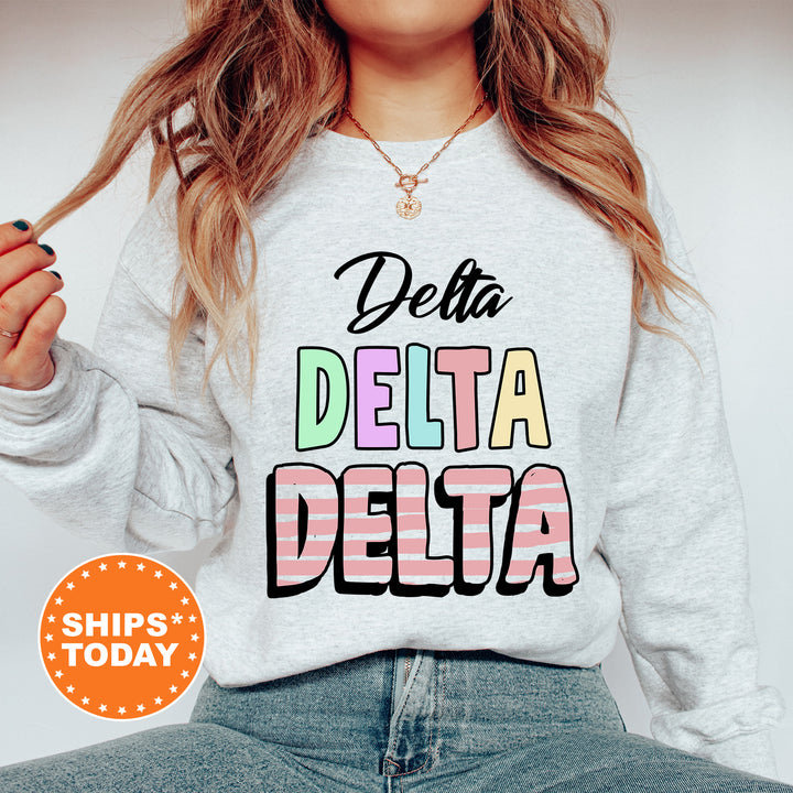 a woman wearing a sweatshirt that says delta delta