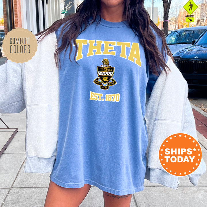 a woman is standing on the sidewalk wearing a blue shirt