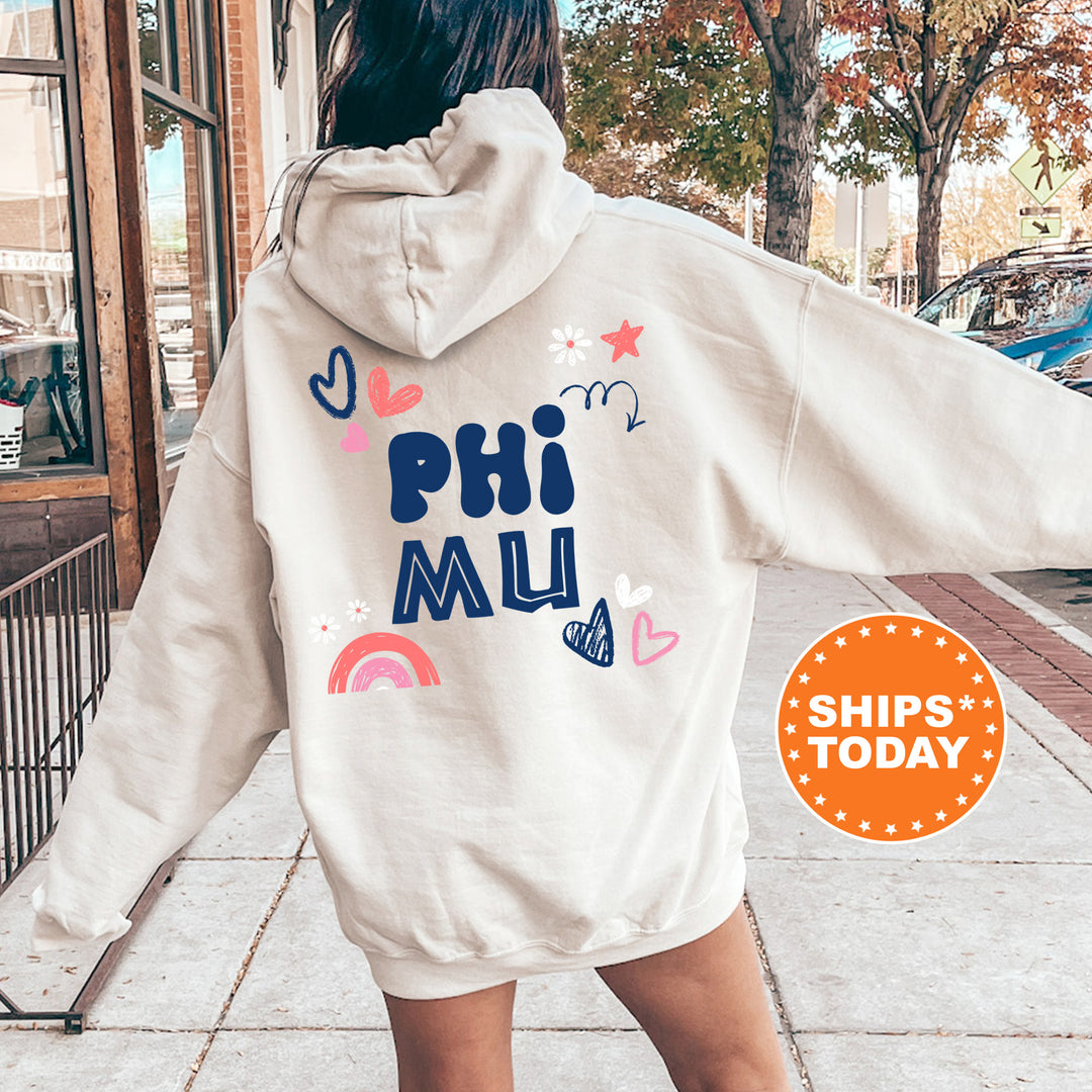a woman walking down a sidewalk wearing a white hoodie