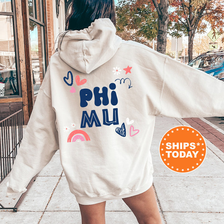 a woman walking down a sidewalk wearing a white hoodie