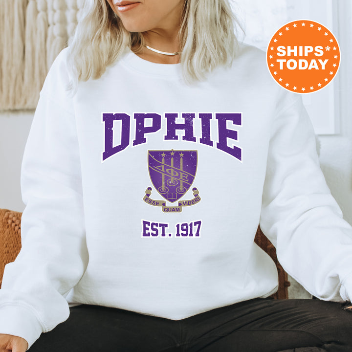 a woman sitting on a chair wearing a white sweatshirt