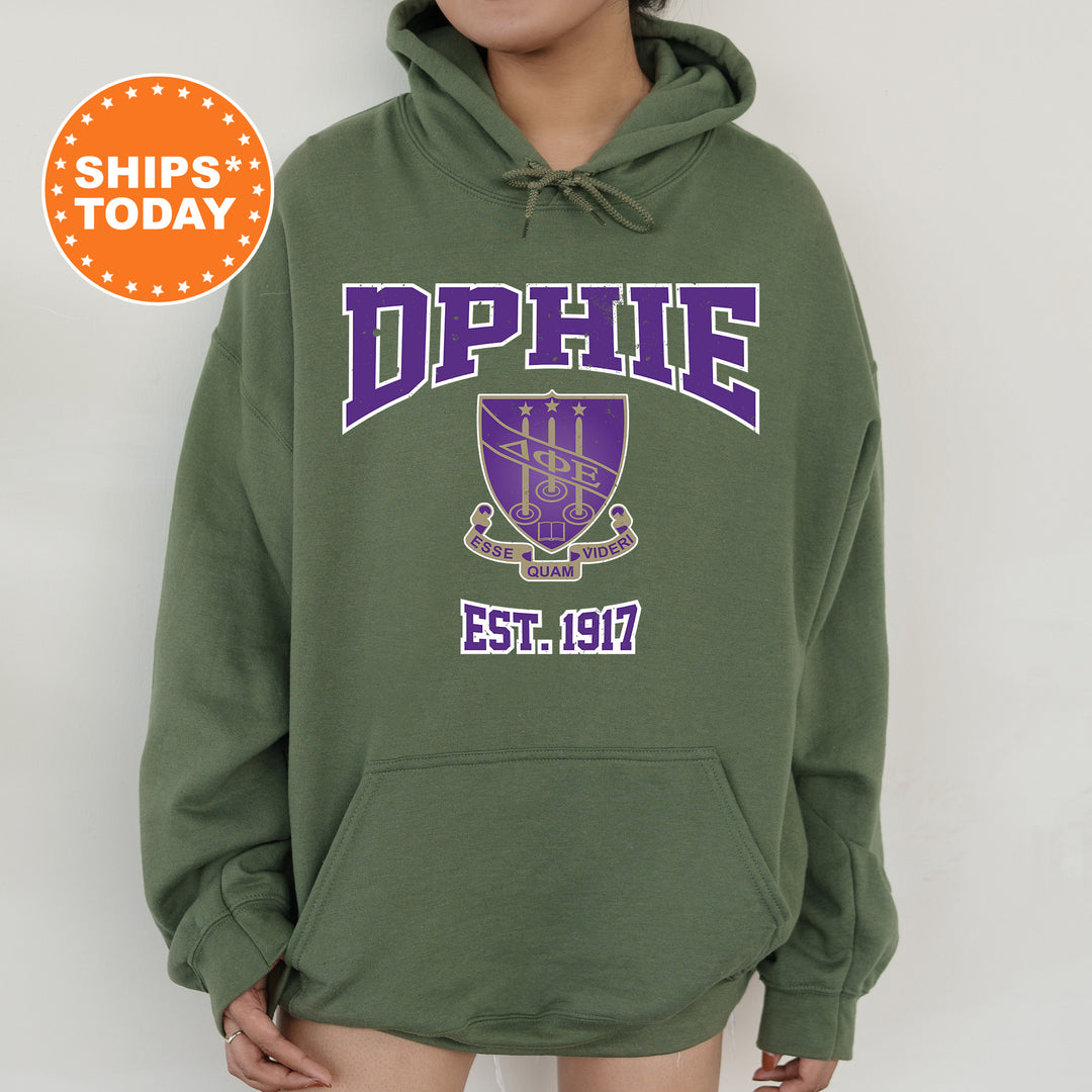 a woman wearing a green hoodie with purple lettering