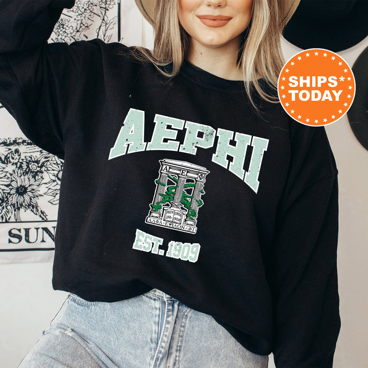 a woman wearing a black sweatshirt with the words aephh on it