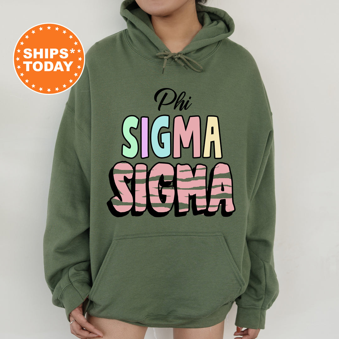 a woman wearing a green hoodie that says ph sigma sigma