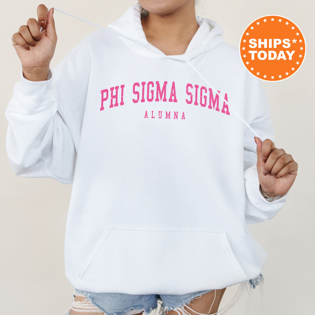 a woman wearing a white hoodie with pink letters on it