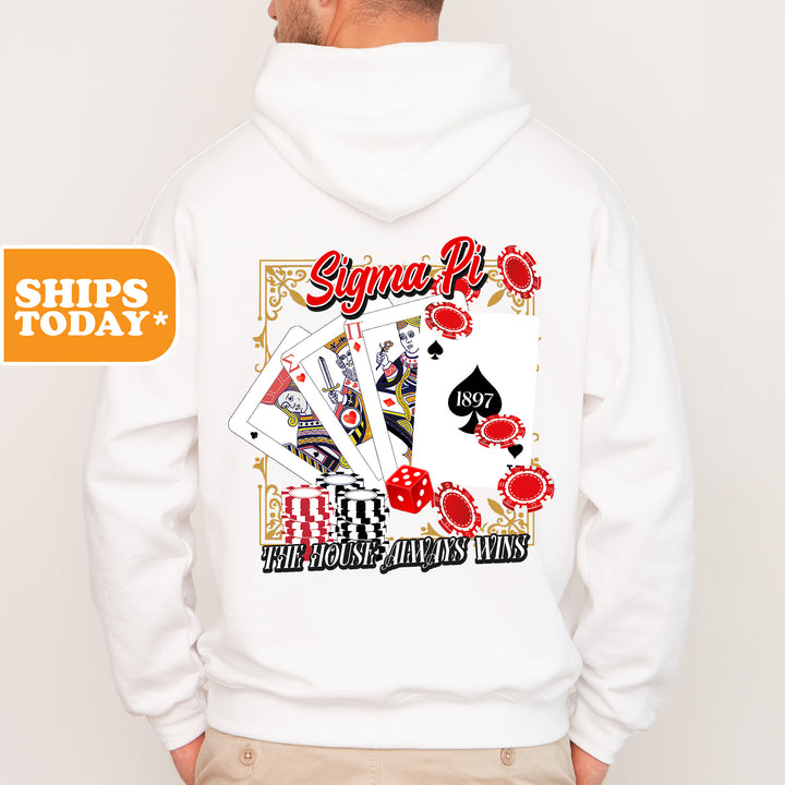 a man wearing a white hoodie with playing cards on it