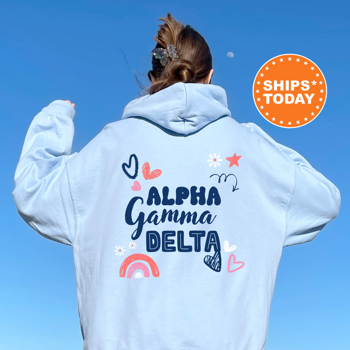 a woman wearing a white hoodie with the words aloh gamma delta