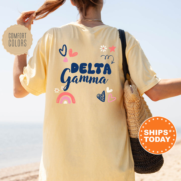 a woman walking on the beach with a bag and a t - shirt