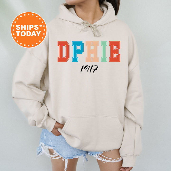 a woman wearing a sweatshirt with the word dppie printed on it